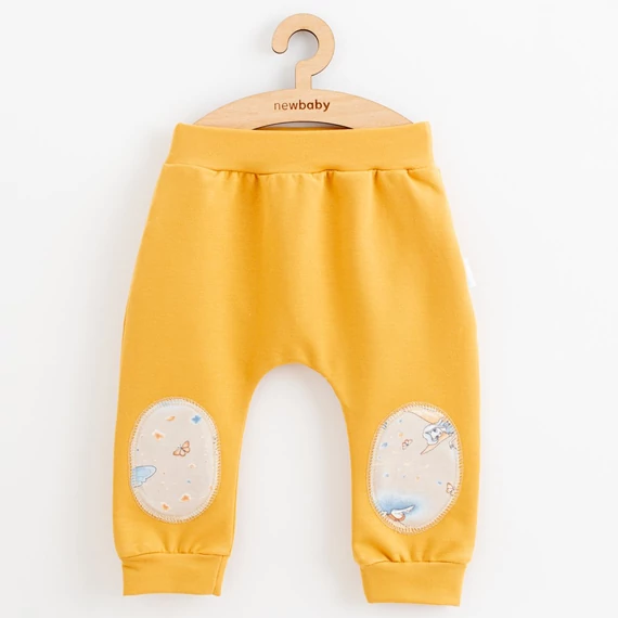 New Baby barna szabadidő nadrág, 56-os méret, rugalmas derékpánt, kényelmes pamut anyag.