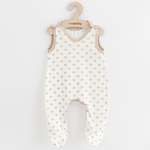 New Baby bézs rugdalózó 74-es méretben, puha pamut anyagból, könnyen öltöztethető, csillagos mintával.
