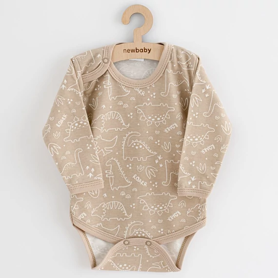 New Baby bézs baba body 74-es méretben, klasszikus dinós design, patentos részletekkel a könnyű öltöztetésért.