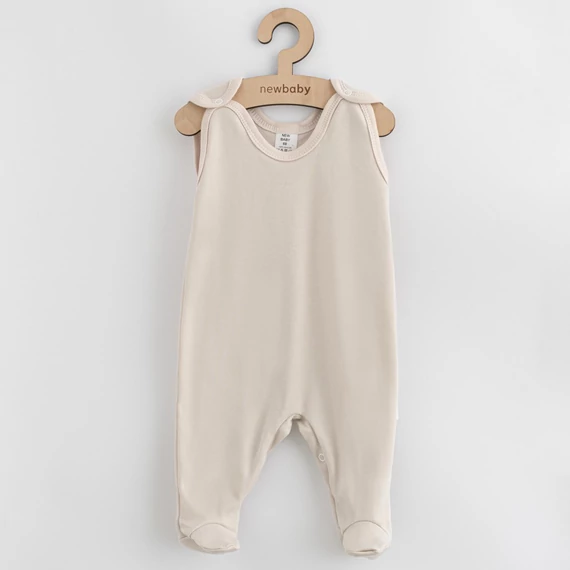 Bézs New Baby rugdalózó, 68-as méret, 100% pamut, kényelmes és praktikus öltöztetéshez.