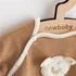 pamut anyagból.|||New Baby barna 2-részes baba együttes